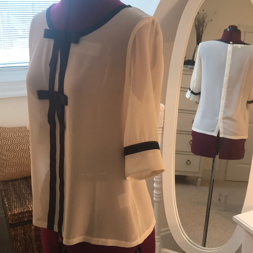 Cream top, royal blue trims